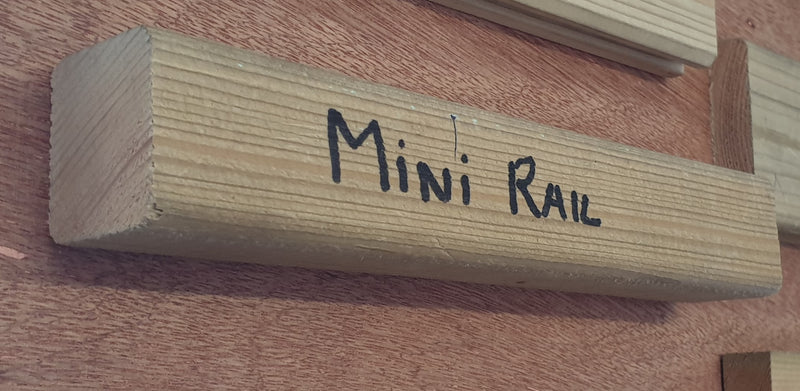 Timber mini rail spindles for decking