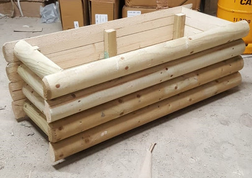 Long wooden trough planter by Abwood