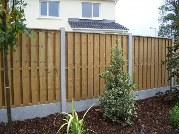 Hit and miss capped fencing with 5 inch boards by Abwood