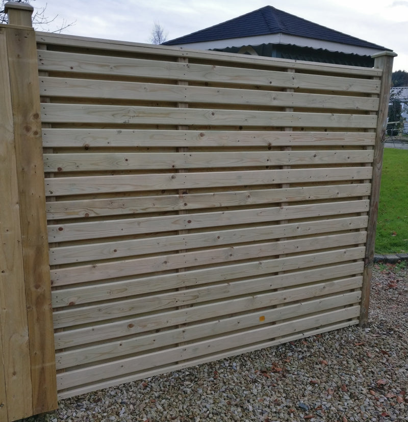 Glan hit and miss fencing on timber posts by Abwood
