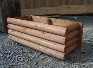 Timber planter with barrel board timber