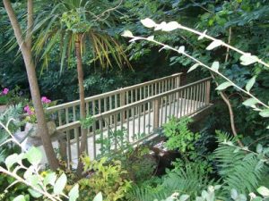 Wooden Footbridge with Garden Background from Abwood
